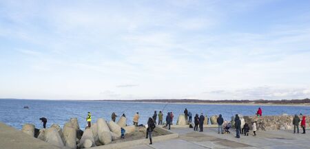 People fish in cold weather
