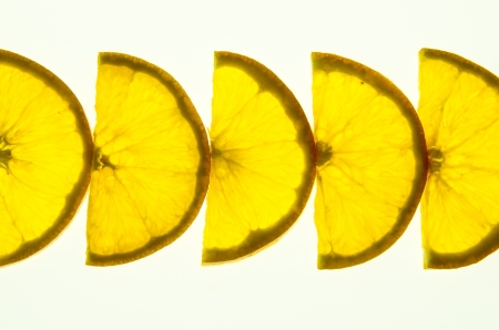  cutting a piece of orange meat  Then the same sort の写真素材
