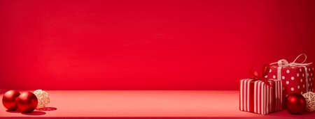 Christmas gift box, Christmas ball Ornaments on brown paper top flat layout blank copy space for text.の写真素材