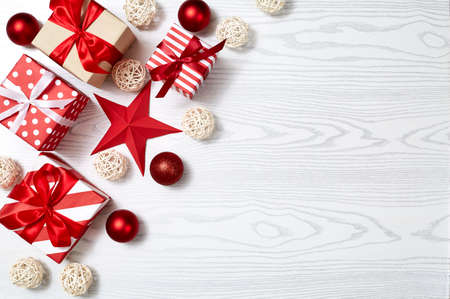 Christmas gift box, Christmas ball Ornaments on brown paper top flat layout blank copy space for...