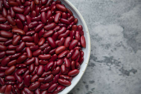 Grains Red bean in bowl put on concrete background