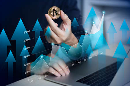 Male using laptop investment in bitcoin crypto currency blockchain technology trading concept