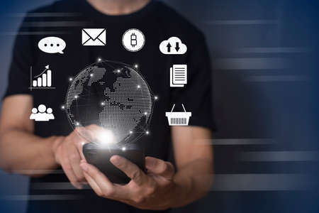 man using smartphone to do online transactions with data connection around the world by internet technology, big data, data search, online marketingの写真素材