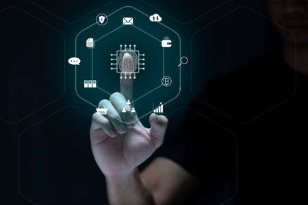 Person touching virtual screen to scan fingerprints, digital transformation management concept....