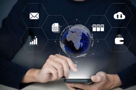 Businessman using smart phone to do online transactions with internet technology, concept of global...