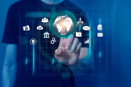 Businessman touches virtual screen technology to do online transactions via internet Connect data to...