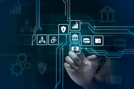 Businessman touches virtual screen technology to do online transactions via internet Connect data to...