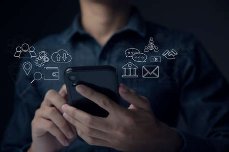 Businessman using smart phone to do online transactions with internet technology, concept of global...