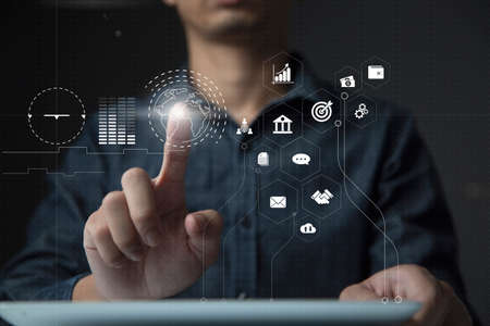 Businessman using tablet and virtual touch screen to online transactions with internet technology,...