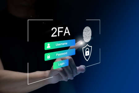 Businessman touching virtual screen to fingerprint scan for two-factor authentication for safety use...