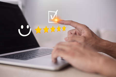 Satisfaction and customer service survey concept, business people using laptops. to answer the...