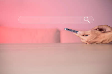 Search technology, search engine optimization, man's hand using smartphone to search information,...
