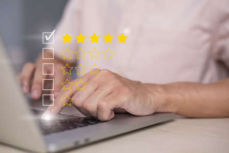 Satisfaction and customer service survey concept, business people using  laptop. to answer the...