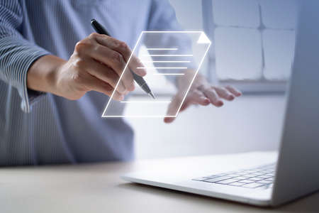 Businesswoman, work from home, handling documents, E-signing, signing digital contracts electronic...