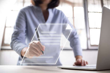 Businesswoman, work from home, handling documents, E-signing, signing digital contracts electronic...