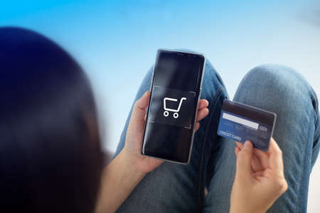 shopper using laptop online shopping. And using credit card online payment option or digital wallet online transaction.の写真素材