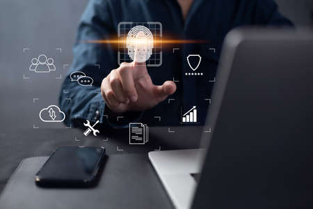 Person touching virtual screen to scan fingerprints, digital transformation management concept....