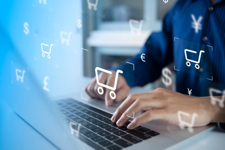 Businessman using computer and touch virtual screen online shopping. And online payment option or digital wallet online transaction concept.の写真素材