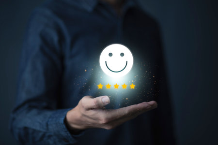 Consumers are evaluating their satisfaction with the service. Consumers write reviews about their satisfaction with a product or service. Consumers use the smiley face icon symbol and 5 stars.の写真素材