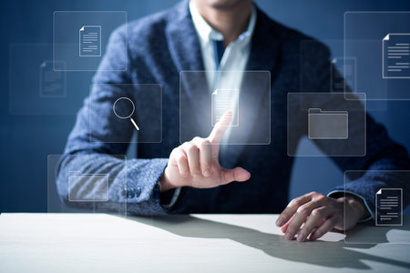 Document Management System DMS and Software for archiving searching and managing files online document database. Consultant information technology setup DMS working on computerの写真素材