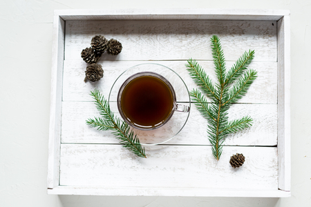 A cup of hot black coffee on a white wooden tray. Breakfast. Top viewの写真素材