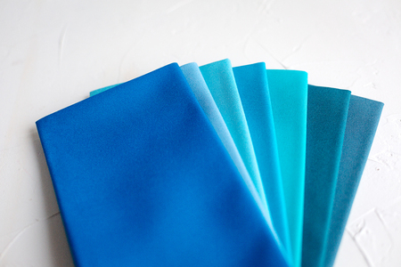 Colorful palette of textile swatches on white background. Color determination stuff for the imagemaker or stylist.の写真素材