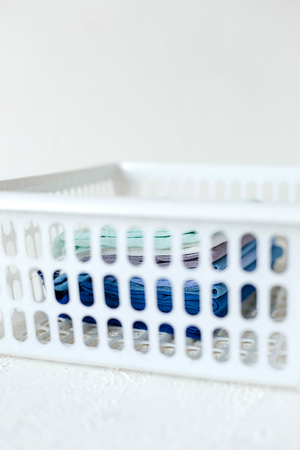 Keeping clothes at the box on white backgroundの写真素材