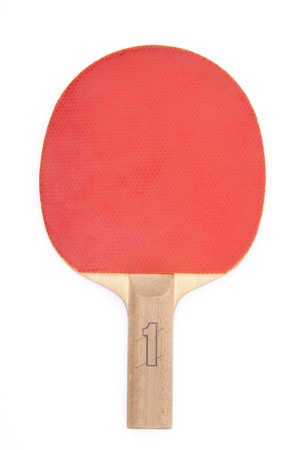 Red table tennis racket in the hand isolatedの写真素材