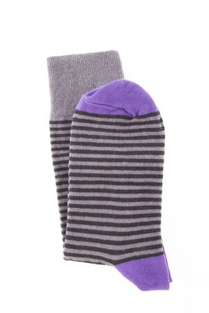 Striped purple sock isolated on white backgroundの写真素材