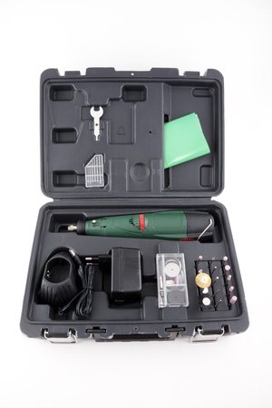 Battery drill in a case isolated on whiteの写真素材