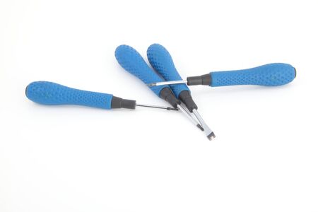 Blue screwdrivers isolated on whiteの写真素材