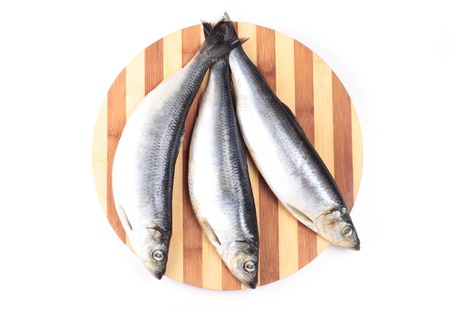 fish on kitchen boardの写真素材