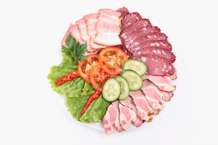 various sausages with vegetablesの写真素材