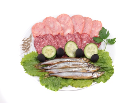 meat and fish on plateの写真素材