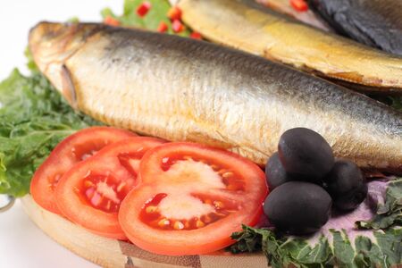 fish with tomato and olivesの写真素材