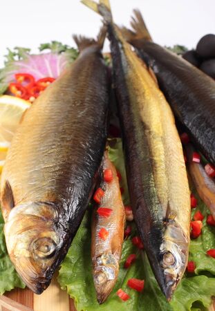 fish on plate with red pepperの写真素材