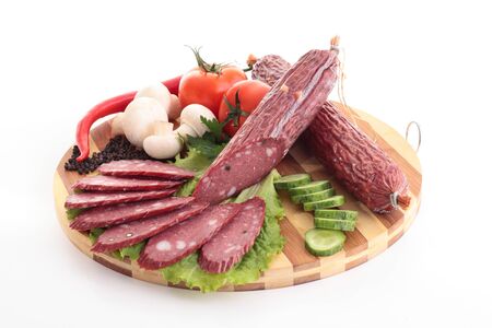 Sliced sausage with vegatablesの写真素材