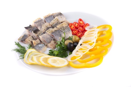 fish on plate with vegetablesの写真素材