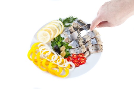 tasting sliced fishの写真素材