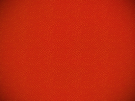 Orange texture looking like basketball leather materialの写真素材