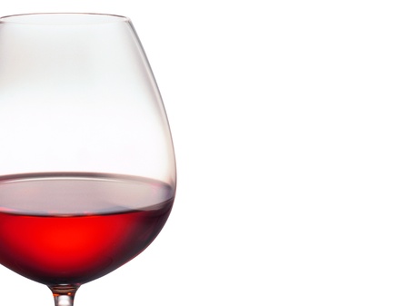Glass of red wine on a white backgroundの写真素材