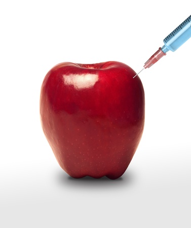 Apple GMO. Apple and syringeの写真素材