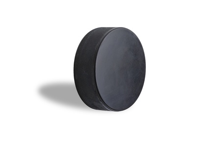 hockey puck isolated on the white backgroundの写真素材