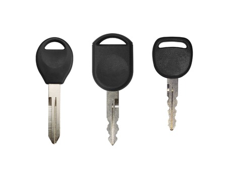 Three keys on a white backgroundの写真素材