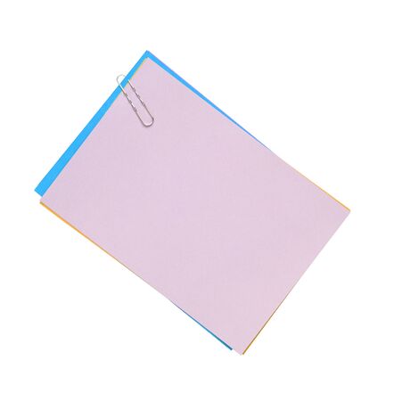Blank note paper and paper-clip. Isolatedの写真素材