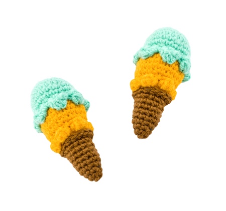 two different flavor ice creams with cone on whiteの写真素材