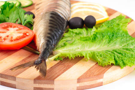sliced herring with vegetablesの写真素材