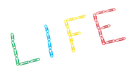 word "life" made with multicolored paper clipsの写真素材