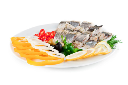 fish with vegetables and olivesの写真素材