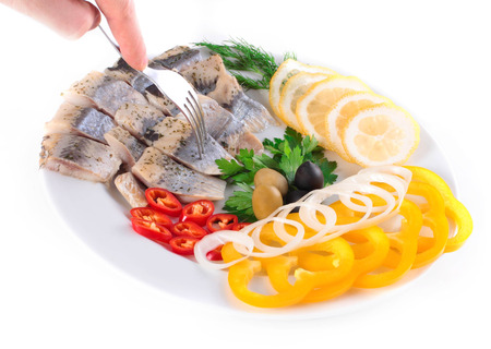 fish on plate with vegetablesの写真素材